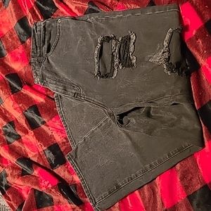 Black straight leg holey jeans